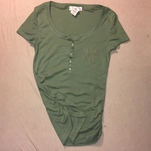 Op green button shirt.